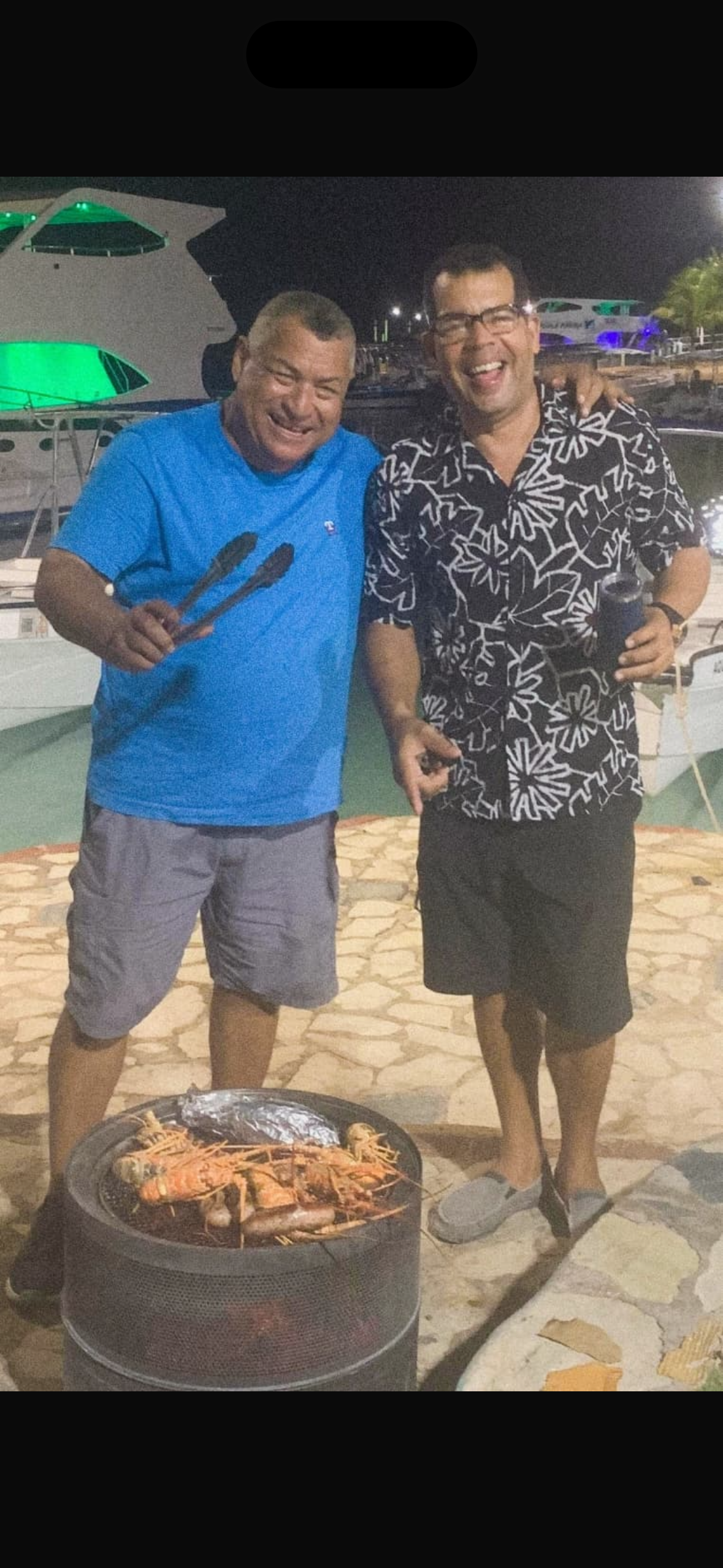 Dario Lopez grilling lobster at the Bayahibe marina